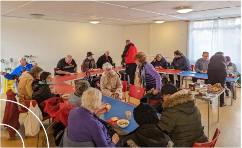 Cllr Jill Desayrah hosting a weekly  community kitchen - providing a warm  space for local residents to meet up,  share stories and raise issues with their  ward councillor.