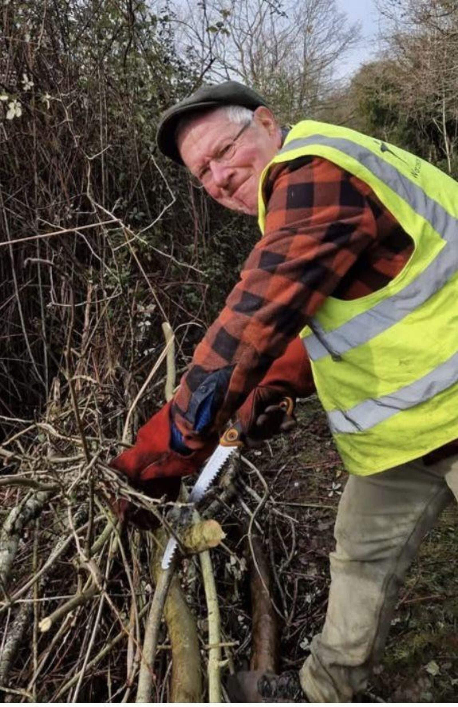 Cllr Adam Scott clearing around the pond at Offerton Lane