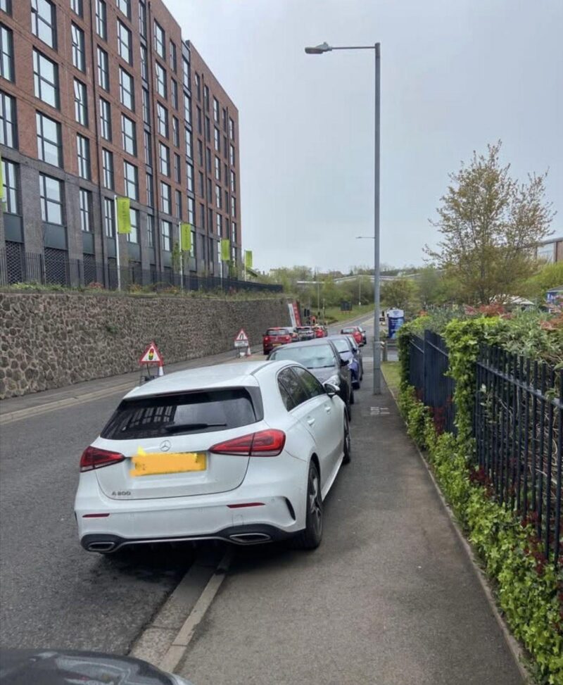     Cars parked along Sheriff Street highlighting congestion and safety concerns